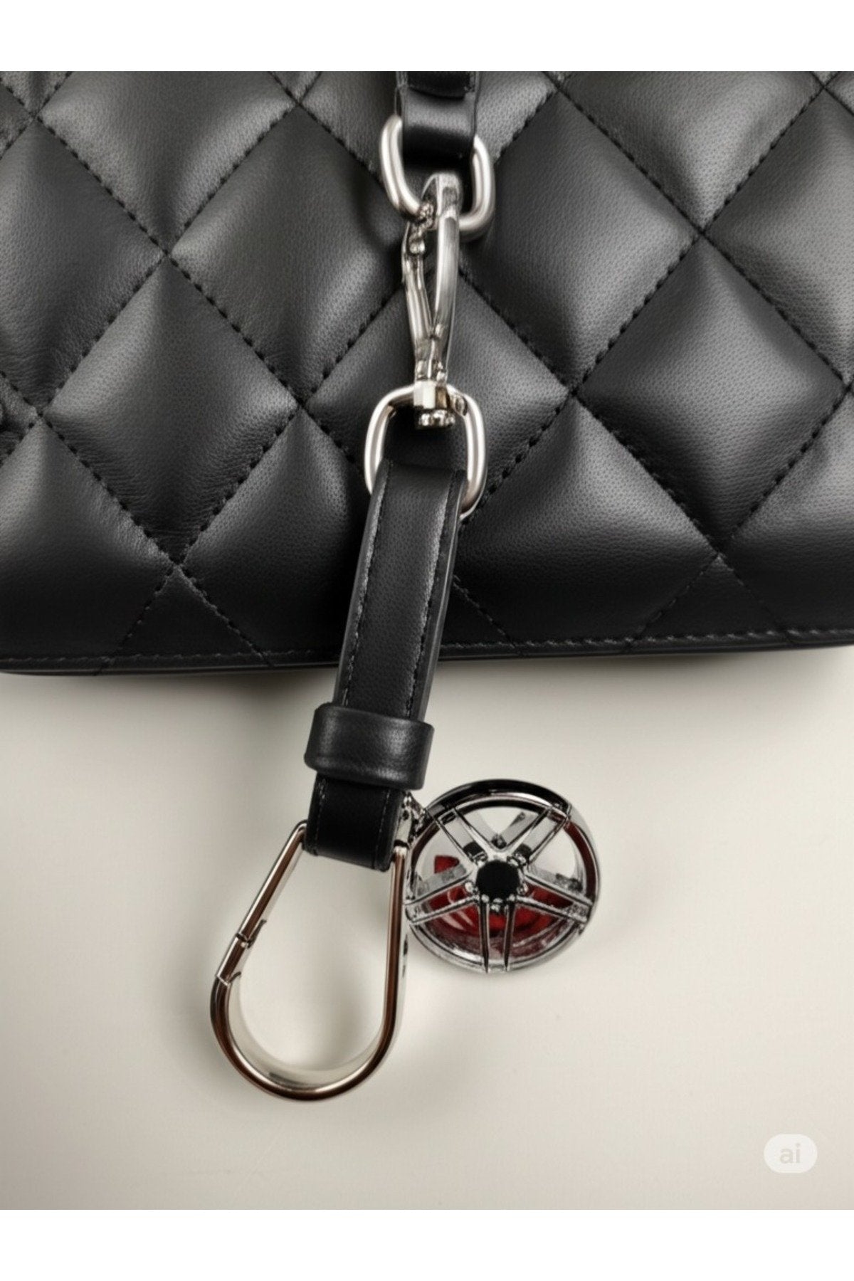 Metal Jant Döner Disk Lüks Anahtarlık – Tekerlek Görünümlü, Dönme Özellikli Araba Aksesuarı