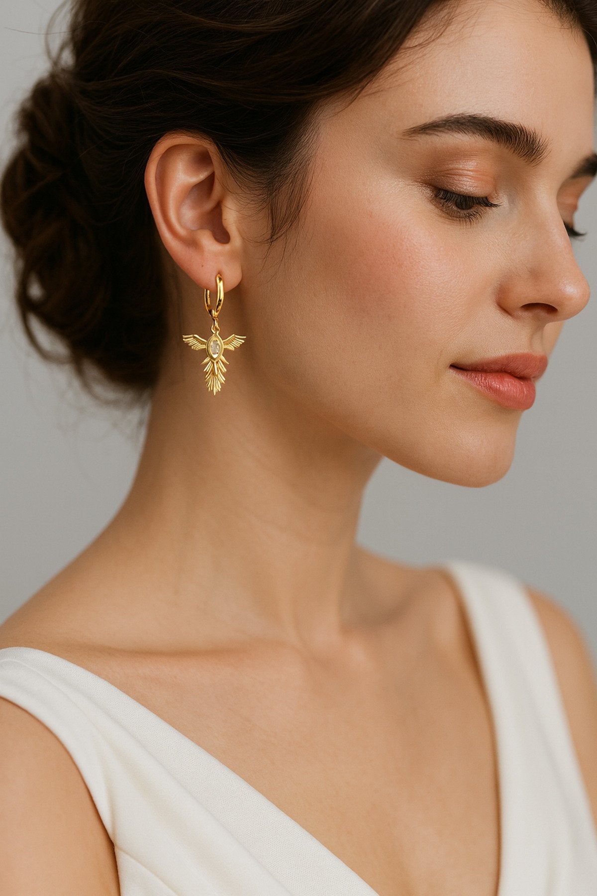 Anka Kuşu Figürlü Altın Kaplama Paslanmaz Çelik Küpe – Zarif, Dayanıklı, Işıltılı